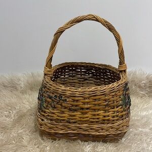 Super cute wicker basket with vine design on the sides